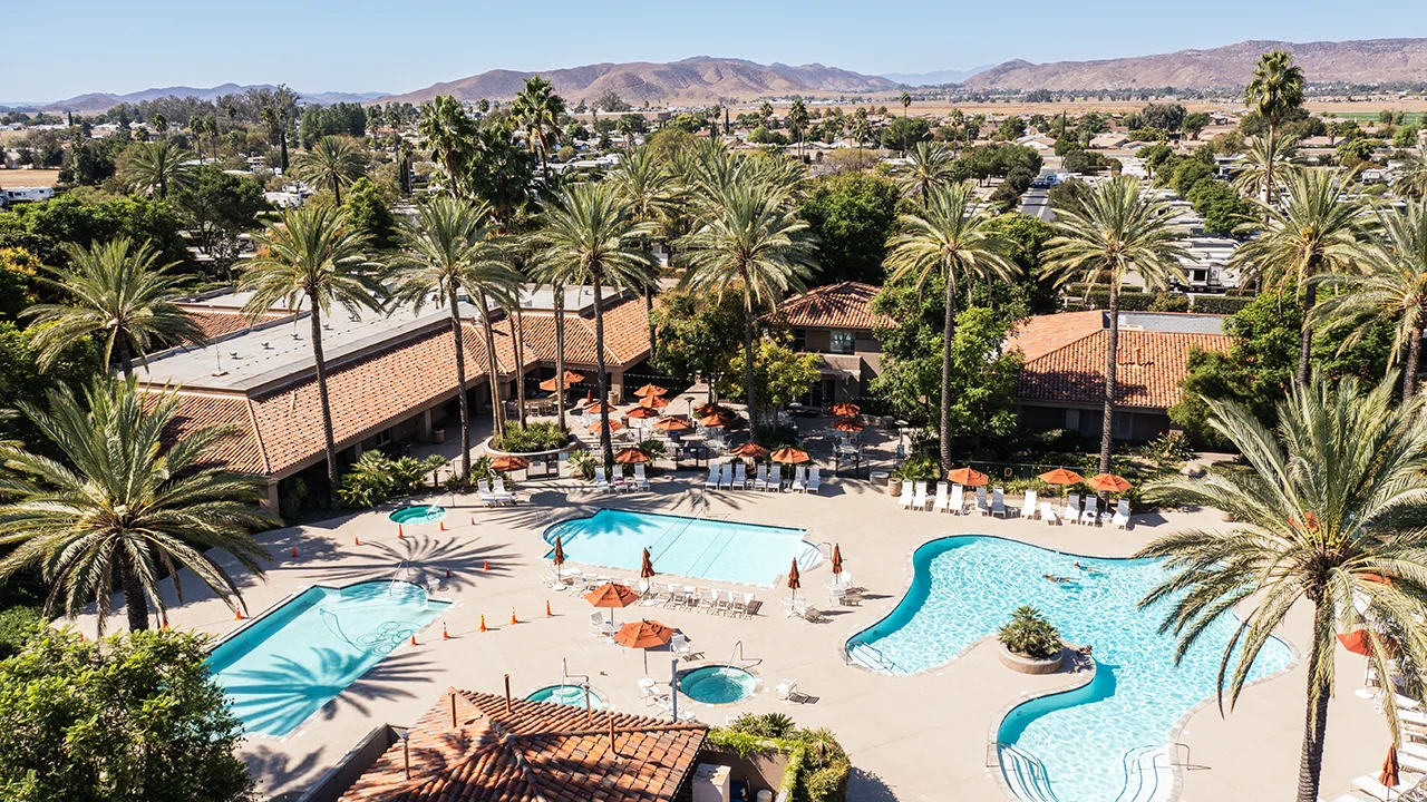 Pool area at Golden Village Palms RV Resort